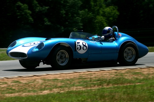 Mark Simpson in a '58 Scarab passing the Oak Tree turn at VIR